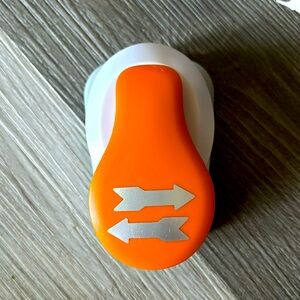 Fiskars arrows punch with secure bottom as seen in pictures